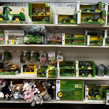 Toy tractors and stuffed animals